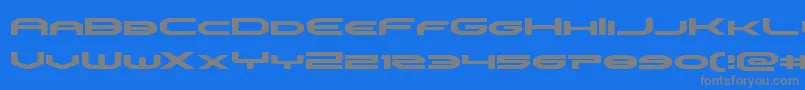 omniboyexpand-fontti – harmaat kirjasimet sinisellä taustalla