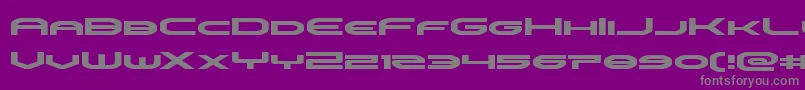 omniboyexpand-fontti – harmaat kirjasimet violetilla taustalla