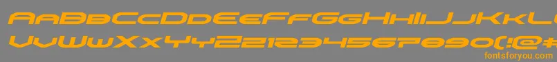 フォントomniboyexpandital – オレンジの文字は灰色の背景にあります。