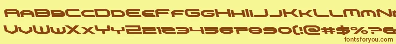 omniboyleft-Schriftart – Braune Schriften auf gelbem Hintergrund