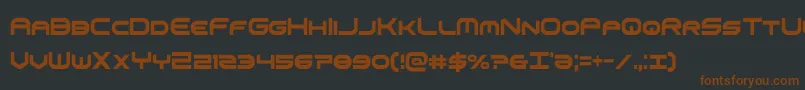 omniboyxtracond-fontti – ruskeat fontit mustalla taustalla