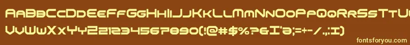 omniboyxtracond-fontti – keltaiset fontit ruskealla taustalla
