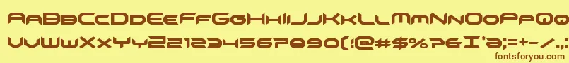 フォントomnigirlcond – 茶色の文字が黄色の背景にあります。