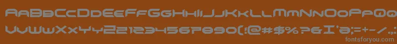 フォントomnigirlcond – 茶色の背景に灰色の文字