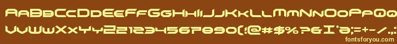 omnigirlcond-fontti – keltaiset fontit ruskealla taustalla