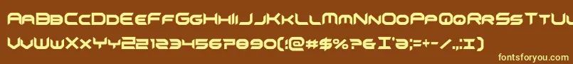 omnigirlxtracond-fontti – keltaiset fontit ruskealla taustalla