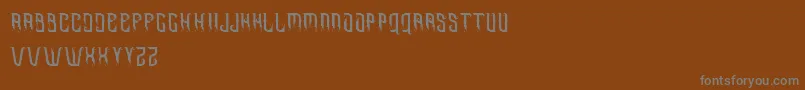 Omnivorous free Font – Gray Fonts on Brown Background