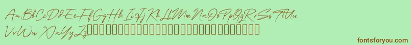 フォントOneSignature – 緑の背景に茶色のフォント