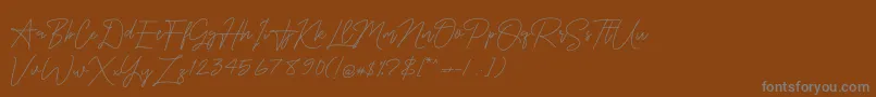 OnesilverSignature-Schriftart – Graue Schriften auf braunem Hintergrund