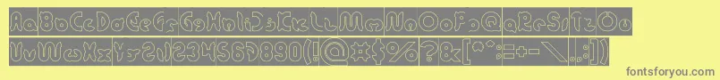 onion rings Hollow Inverse-fontti – harmaat kirjasimet keltaisella taustalla