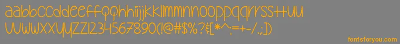 フォントMyOhMyTtf – オレンジの文字は灰色の背景にあります。