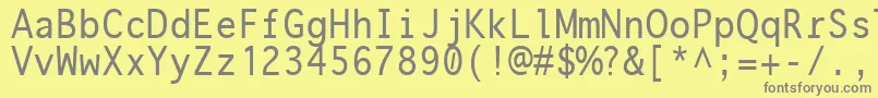 フォントonuava   – 黄色の背景に灰色の文字