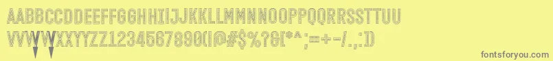 Fonte Open Minded Inside Font by Situjuh 7NTypes – fontes cinzas em um fundo amarelo