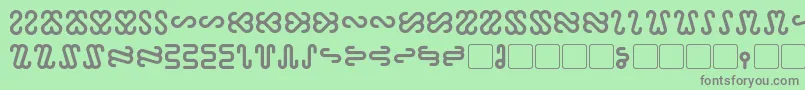 フォントOphidian Bold – 緑の背景に灰色の文字