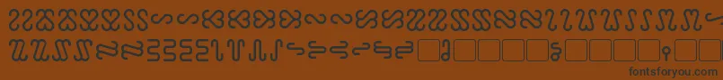 Ophidian Font – Black Fonts on Brown Background