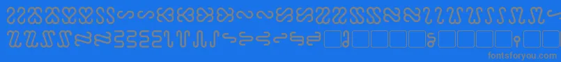 Ophidian-fontti – harmaat kirjasimet sinisellä taustalla