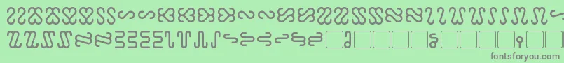 フォントOphidian – 緑の背景に灰色の文字