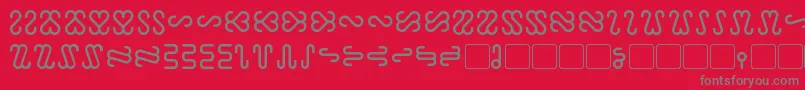 Ophidian-fontti – harmaat kirjasimet punaisella taustalla