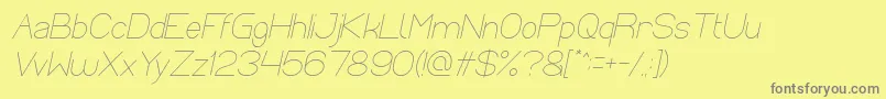Optical Fiber Italic-Schriftart – Graue Schriften auf gelbem Hintergrund