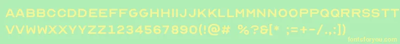 Optiker K Font – Yellow Fonts on Green Background