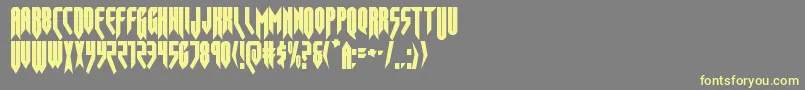 opusmagnuscond-fontti – keltaiset fontit harmaalla taustalla
