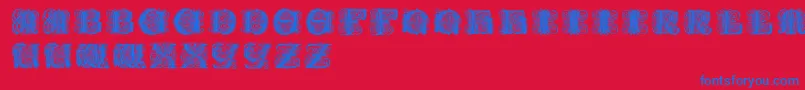 フォントPaulusfranckinitialen – 赤い背景に青い文字