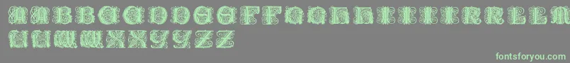 Paulusfranckinitialen Font – Green Fonts on Gray Background