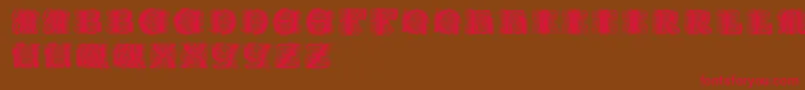 Paulusfranckinitialen Font – Red Fonts on Brown Background