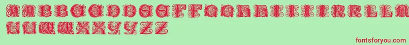 フォントPaulusfranckinitialen – 赤い文字の緑の背景