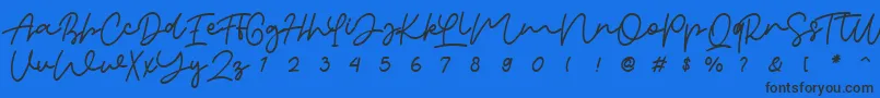 orabelle Font – Black Fonts on Blue Background