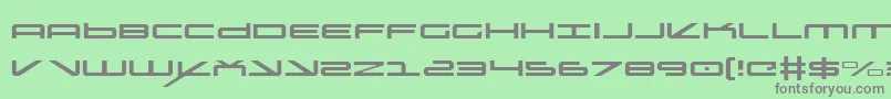 oramaclight-fontti – harmaat kirjasimet vihreällä taustalla