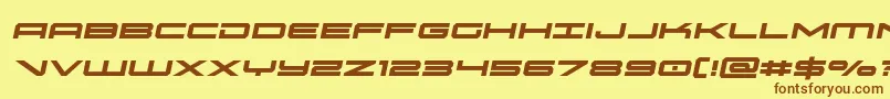 フォントoramacsemital – 茶色の文字が黄色の背景にあります。