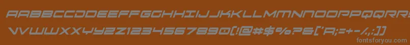oramacxtracondital-Schriftart – Graue Schriften auf braunem Hintergrund
