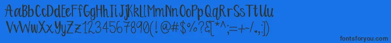 OrangeBlossoms Font – Black Fonts on Blue Background