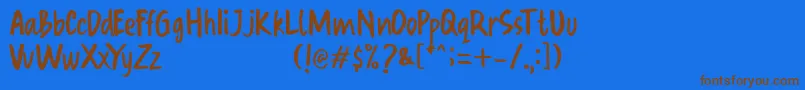 フォントOraret – 茶色の文字が青い背景にあります。