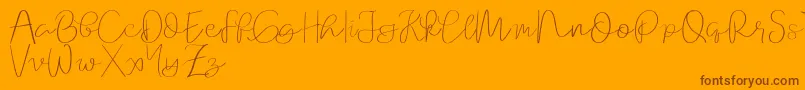 Orchard   demo-Schriftart – Braune Schriften auf orangefarbenem Hintergrund