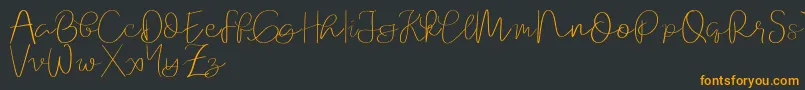 Шрифт Orchard   demo – оранжевые шрифты на чёрном фоне