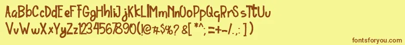 Шрифт Ordinary Brush Font – коричневые шрифты на жёлтом фоне