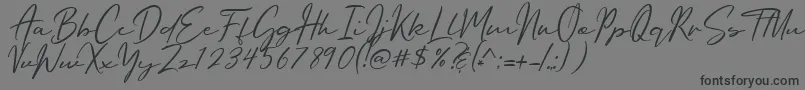Oriflame Script Font – Black Fonts on Gray Background