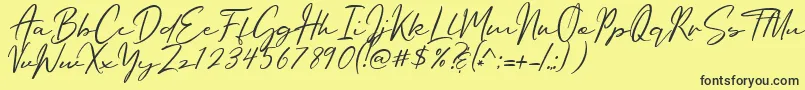 Oriflame Script Font – Black Fonts on Yellow Background