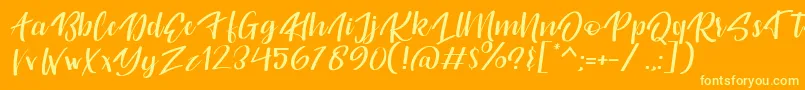 Шрифт Originality Personal Use – жёлтые шрифты на оранжевом фоне