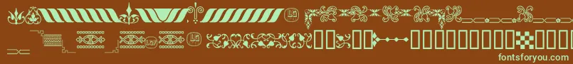 OrnamentosOrlasyVinetasLGt-fontti – vihreät fontit ruskealla taustalla
