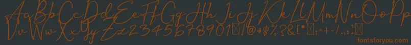 OrtisanSignature-fontti – ruskeat fontit mustalla taustalla