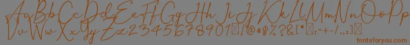 OrtisanSignature-Schriftart – Braune Schriften auf grauem Hintergrund