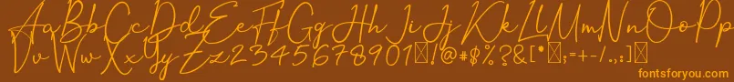 Czcionka OrtisanSignature – pomarańczowe czcionki na brązowym tle