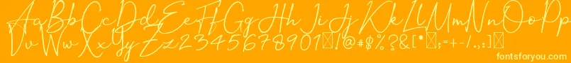 OrtisanSignature-Schriftart – Gelbe Schriften auf orangefarbenem Hintergrund