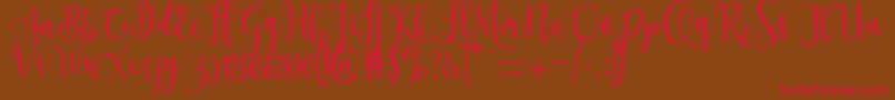 Ossellany Script Font – Red Fonts on Brown Background