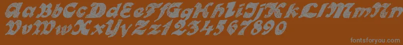 Weitere Informationen zur OttoLand-Schriftart OttoLand-Schriftart – Graue Schriften auf braunem Hintergrund
