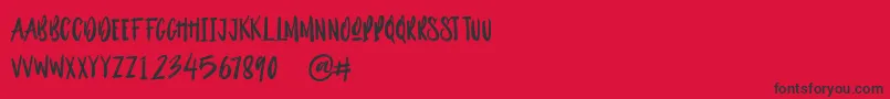 Outistyle Brush Font – Black Fonts on Red Background