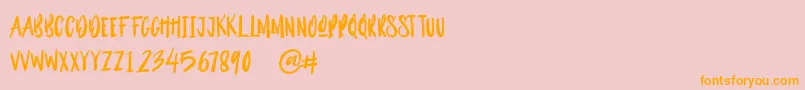 Outistyle Brush Font – Orange Fonts on Pink Background